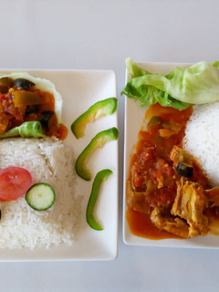 A picture of Boiled Rice with Chicken Curry Stew.