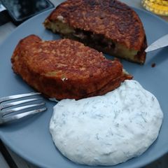A picture of Grilled Potatoes Pancakes with Meat.