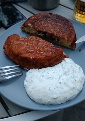A picture of Grilled Potatoes Pancakes with Meat.