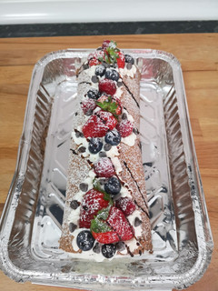 Una foto de Brazo de chocolate y frutos rojos