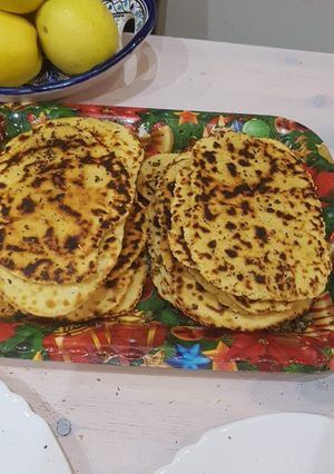 O poză a rețetei Pâine naan cu usturoi și unt.