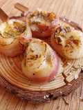 Brocheta de provolone con panceta curada a la pimienta