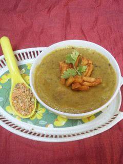 A picture of Mix Lentils Soup with Fries.