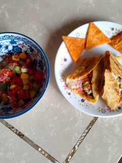 A picture of MexicanTortilla wrap with Salsa.
