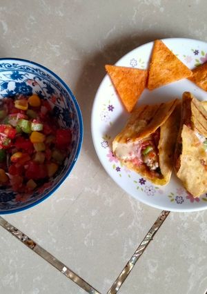 A picture of MexicanTortilla wrap with Salsa.