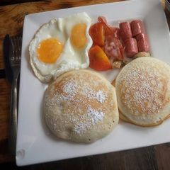 A picture of Pancake with sausage and egg.