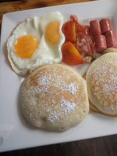 A picture of Pancake with sausage and egg.