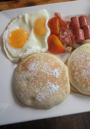 A picture of Pancake with sausage and egg.