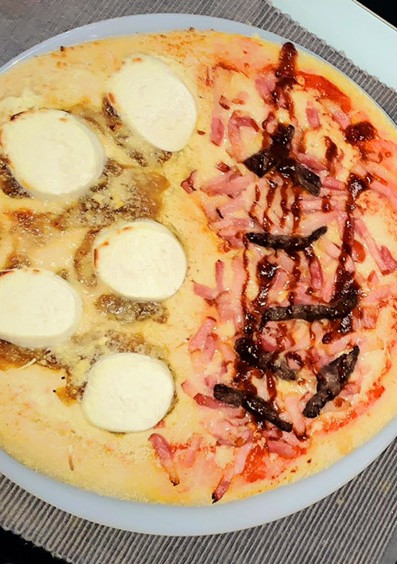 Una foto de Pizza al estilo domino’s 🍕😍