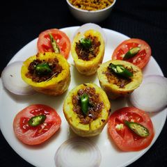 A picture of Soyagranulues stuffed in Boil Potatoes.