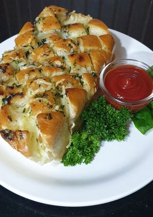A picture of Pull apart Herby Cheese Garlic Bread.