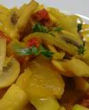Salteado de calabacín con champiñones , tomate seco y Agua de Mar