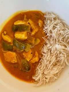 Una foto de Pollo al curry 🧡