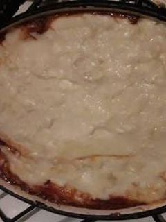 Una foto de Postre Leche Con Harina 😋