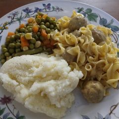 A picture of Golden Mushroom Meatballs and Noodles.