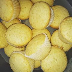 A picture of Orange strawberry cupcakes.