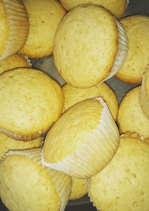 A picture of Orange strawberry cupcakes.