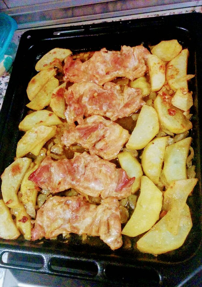 Una foto de Contramuslos de pollo con vino al horno