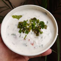 A picture of Onion tomato raita.
