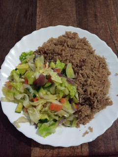 A picture of Beef pilau with veggies.