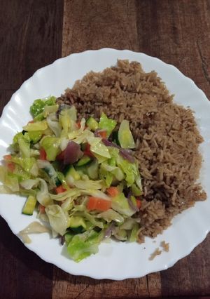 A picture of Beef pilau with veggies.