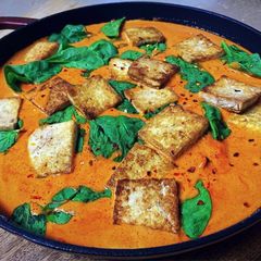 A picture of Red Coconut Peanut Curry with Spinach & Tofu.
