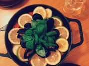 A picture of chicken and seafood paella