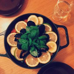 A picture of Seafood and chicken paella.