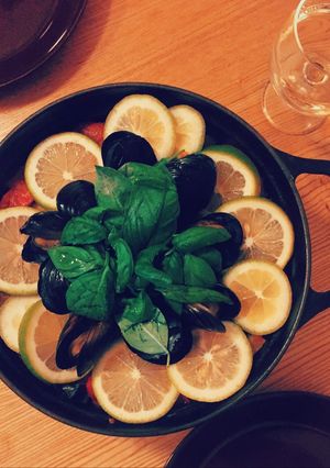 A picture of Seafood and chicken paella.