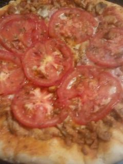 Una foto de Pizza de pollo y beicon 