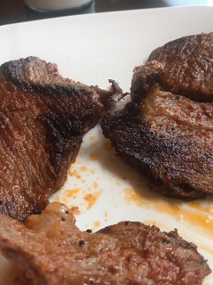 Una foto de Carne con salsa de tomate