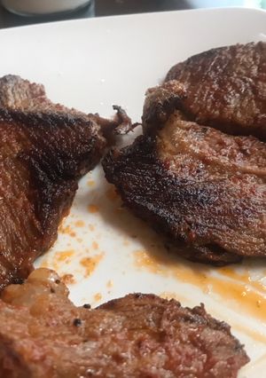 Una foto de Carne con salsa de tomate