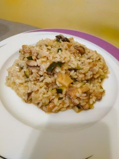 Una foto de Arroz meloso de calabacín con setas ☺️