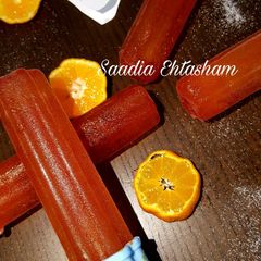 A picture of Orange lollies.