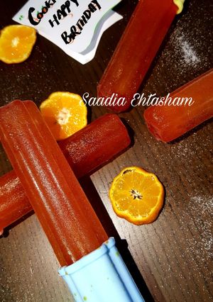 A picture of Orange lollies.