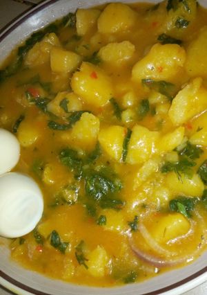 A picture of Yam porridge and boiled egg.
