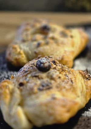 A picture of Hazelnut cream stuffed puff squares.