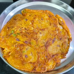 A picture of Besan greenchill onion Chilla.