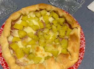 Foto di Torta salata con patate, prosciutto e mozzarella
