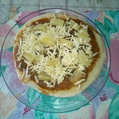 Cheesy pineapple pizza.#BakingForKids A picture of Cheesy pineapple pizza.#BakingForKids.