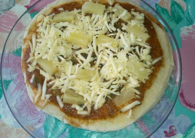 Steps to Prepare Any-night-of-the-week Cheesy pineapple pizza.#BakingForKids