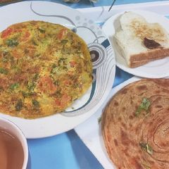 A picture of Simple Omelet with Lacha Paratha n Tea.