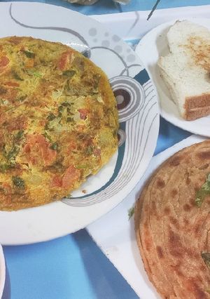 A picture of Simple Omelet with Lacha Paratha n Tea.