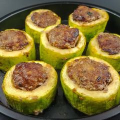 A picture of Asian Meatball Stuffed Zucchini.
