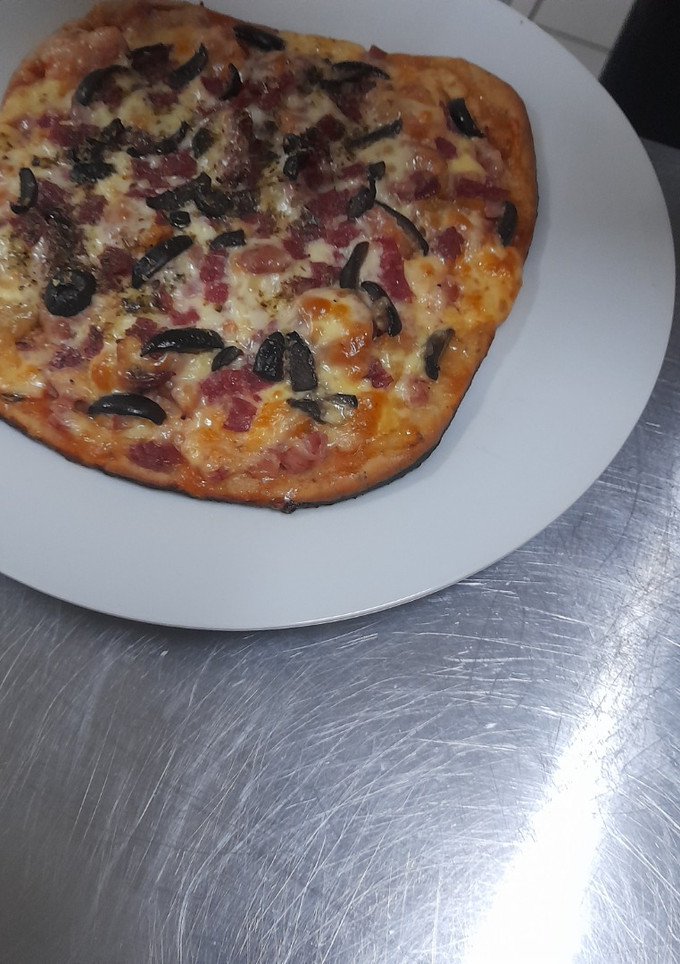 Una foto de Pizza