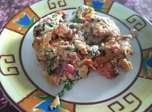 Foto de Ovos mexidos com rúcula e tomate seco