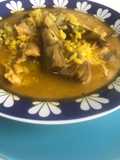 Arroz caldoso con lomo y alcachofas