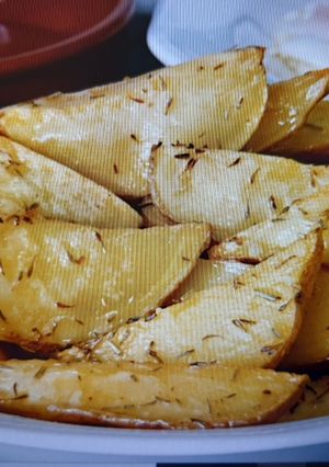 Una foto de Patatas con romero #meapunto