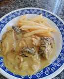 Lomo con crema de champiñones y cerveza
