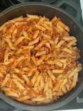 Macaroni with Tomato Sauce, Onion, Bacon, Ground Beef, and Chorizo